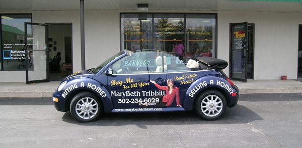 Vehicle wrapped for real estate marketing professional
