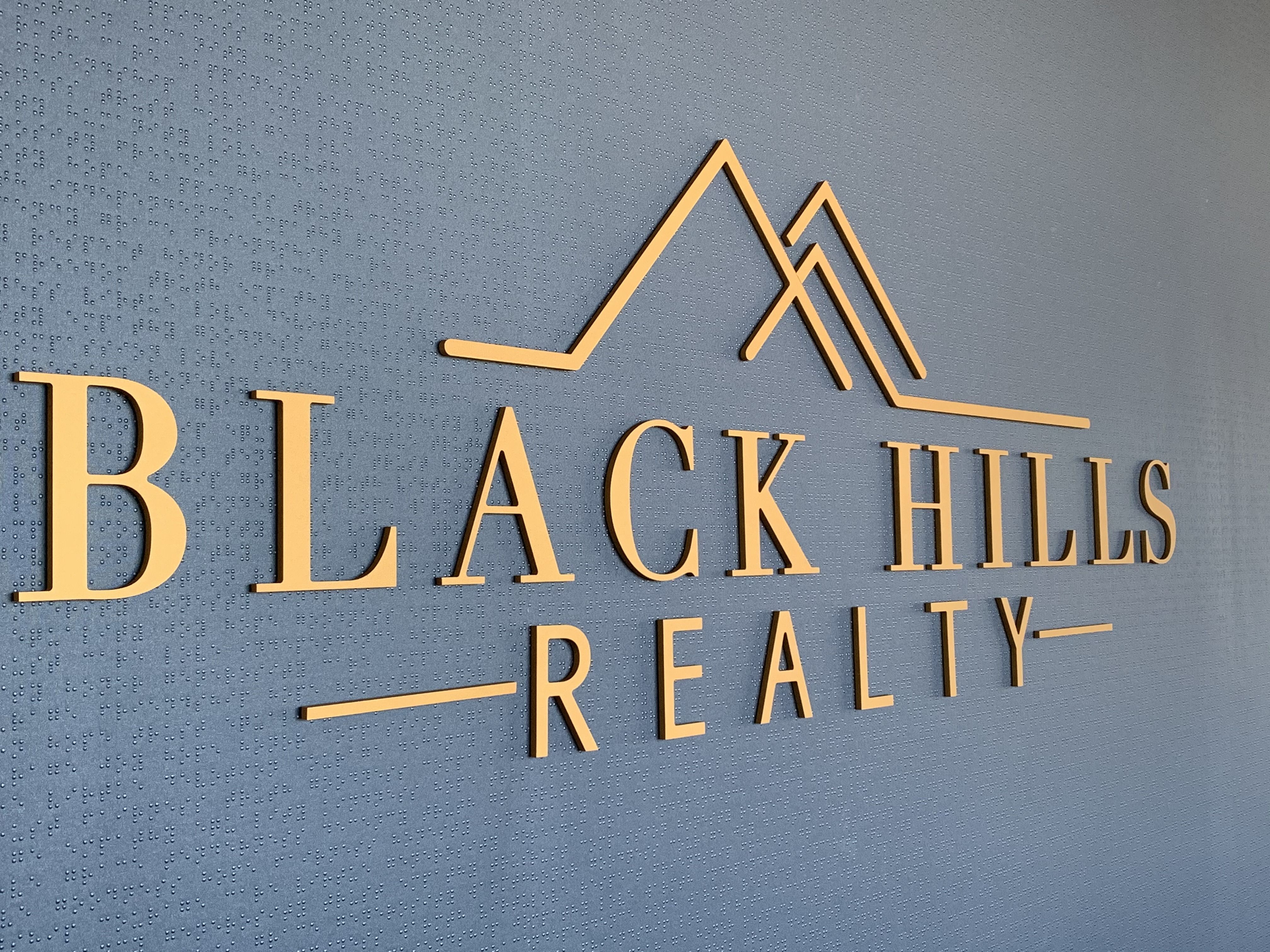 3D custom logo sign for real estate lobby