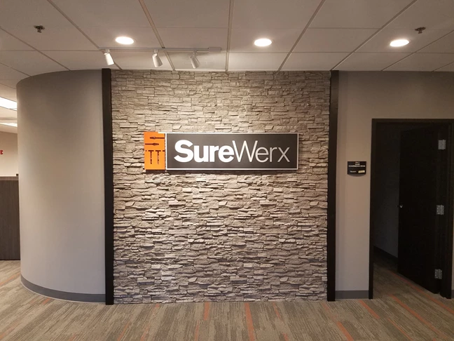 3D Signs & Dimensional Logos | Corporate Branding Signs | Manufacturing Signs | stone wall
