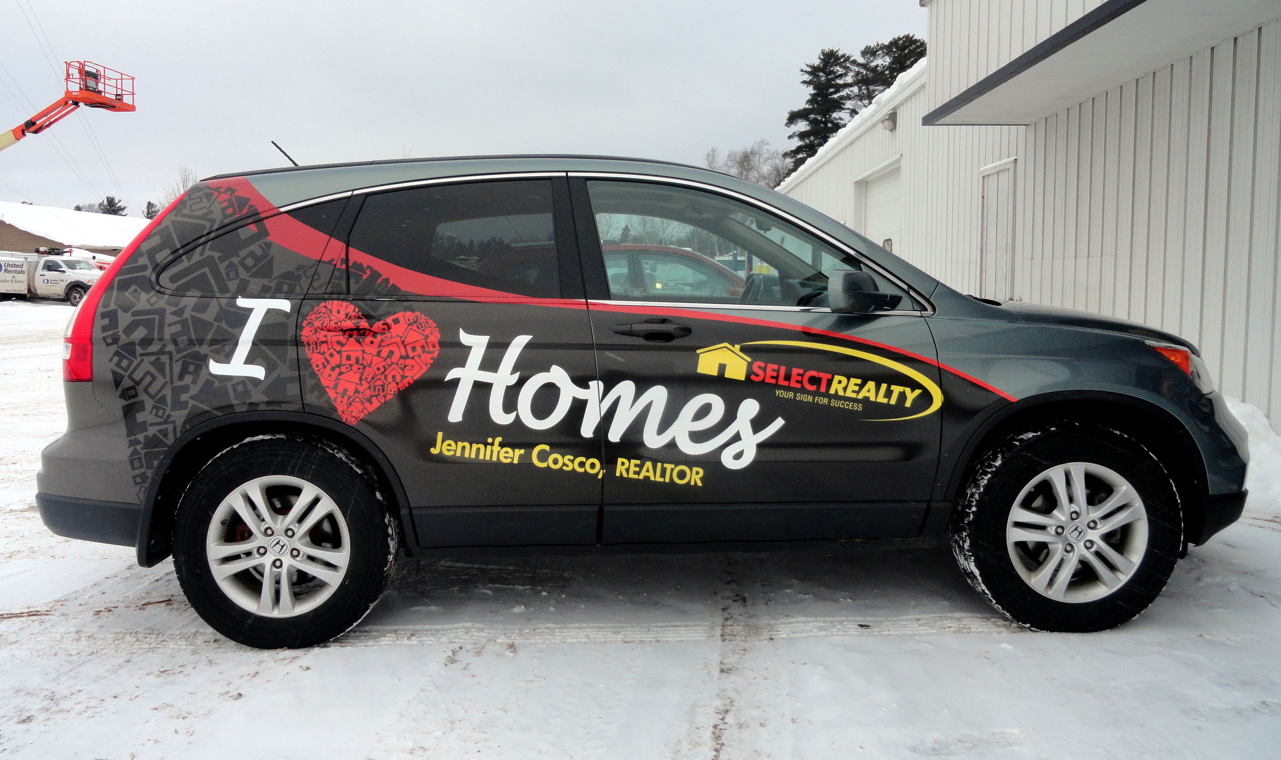 Vehicle with custom graphics and lettering