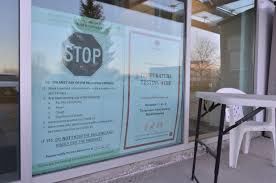 regulatory window sign outside business