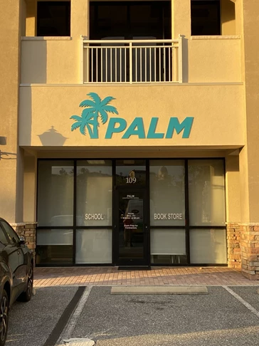 Teal Palm Logo hung on building exterior | Entertainment & Club Signs | Orlando, FL | Acrylic