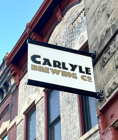 Custom Sign Printing | Healthcare Clinic and Practice Signs | Rockord, IL | Aluminum | Carlyle Brewing Co | GoRockford | Blade Signs | Exterior Signs Rockford | Business Signs Rockford 