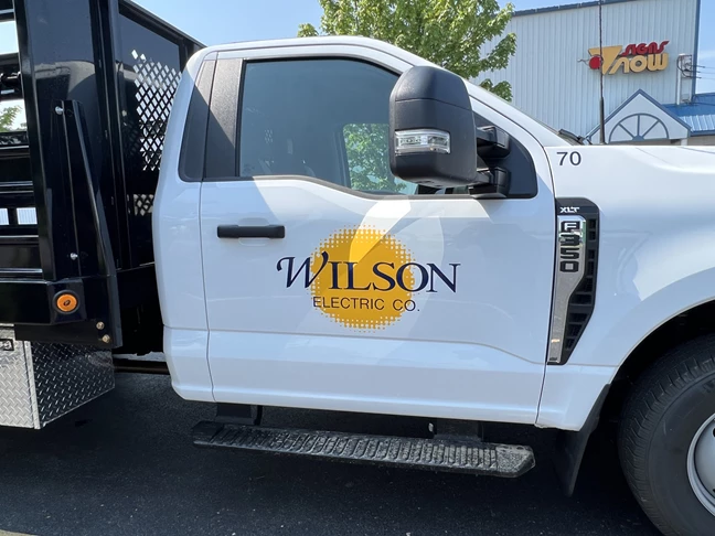 Vehicle Lettering | Professional Services Signs | Rockford, IL | Vinyl | Wilson Electric | Truck Graphics | Custom Graphics | Vinyl Graphics | Vehicle Wraps