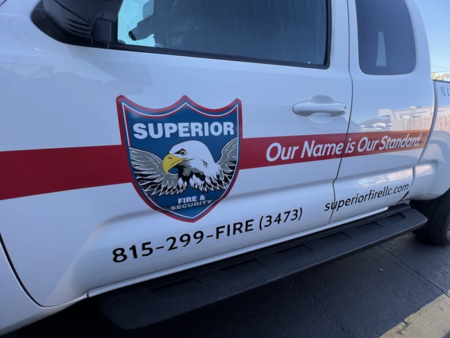 Vehicle Lettering | Professional Services Signs | Rockford, IL | Vinyl | Superior Security | Vehicle Wraps | Vinyl Wraps | Truck Wraps | Custom Graphics | Vehicle Graphics 