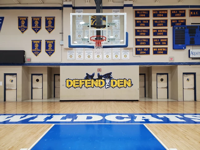 Defend the Den Wall Graphics for School Gymnasium at Davenport North High School 