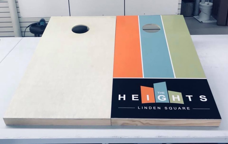 The Heights Apartments | Linden Square | Cornhole Game | Custom Vinyl Graphics | Gladstone, MO The Heights Apartments | Linden Square | Cornhole Game | Custom Vinyl Graphics | Gladstone, MO