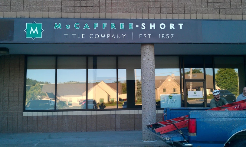 Corporate Branding Signs | Vinyl Lettering | Corporate Signs | Kansas City, MO | Real Estate | Storefront Sign | McCaffree-Short | Title Company